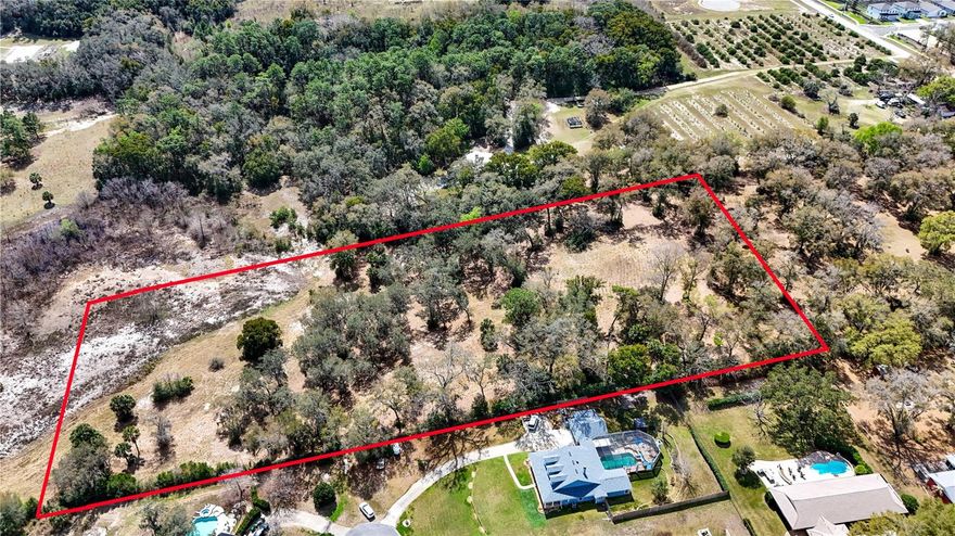 Scenic 6.54 acre property located on a quiet cul de sac, offers wide open spaces complete with majestic oaks, a few gentle slopes, views of seasonal Lake Lincoln and No HOA. Plenty of room to construct your ideal home in a peaceful setting, while still being close to main roads, schools, and amenities for convenience.  Survey available upon request.  Call for more details!