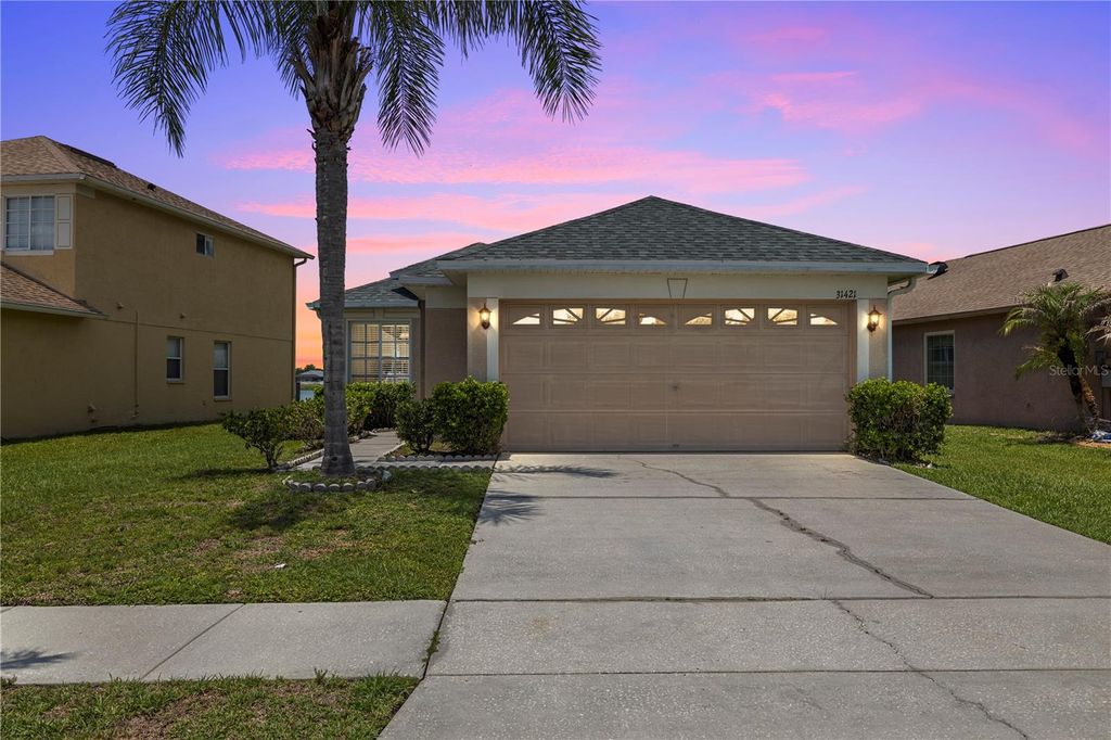 Photo of 31421 Triborough Drive, Wesley Chapel, FL 33545 (MLS # TB8510349)