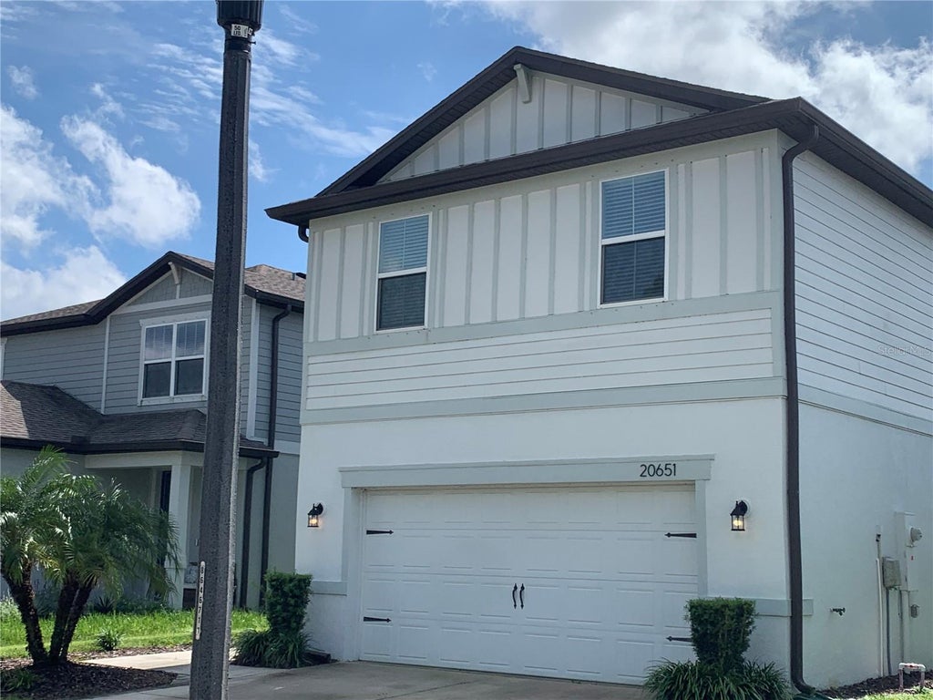 Photo of 20651 Monza Loop, Land O Lakes, FL 34638 (MLS # S5159560)