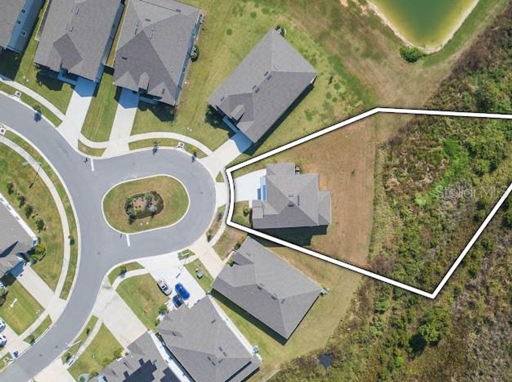 Photo of 9503 Ibis Grove Boulevard, Wesley Chapel, FL 33545 (MLS # TB8441754)