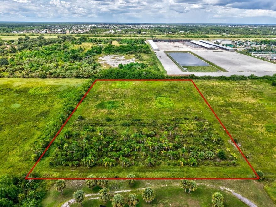 Currently zoned RE-1 but retaining its original grandfathered AE zoning, this property offers rare flexibility for agricultural, equestrian, livestock, and commercial agricultural ventures in Southwest Florida. Located just minutes from Port Charlotte, I-75, and US-41, it provides both the privacy of country living and the convenience of quick access to major routes, shopping, dining, and Gulf Coast beaches. This tract includes approximately 3.73 acres (330 x 492.8) with owner financing available and is one of seven parcels offered—totaling up to 45 acres if purchased together. Formerly a thriving tree farm, the land is ideal for crops, pasture, horses, or cattle, with sandy-loam soil, irrigation and 4 inch well that provide abundant water for hay, fodder, and specialty crops. The property’s location and infrastructure also make it perfect for a Florida nursery property, landscaping business, or small farm operation, and it would make an outstanding private home site for those looking to move to Southwest Florida. With no wetlands or stormwater set-asides, every acre is usable, and existing oak and palm trees can be retained, relocated, or cleared. A nearby vacant lot on Harborview Rd. is also available for signage or an office location. Whether you are searching for Port Charlotte acreage for sale, Florida horse property with wells and irrigation, or the perfect Florida acreage home site with quick access to I-75 and US-41, this unique offering delivers location, infrastructure, and agricultural potential in one of the most desirable areas of the state.