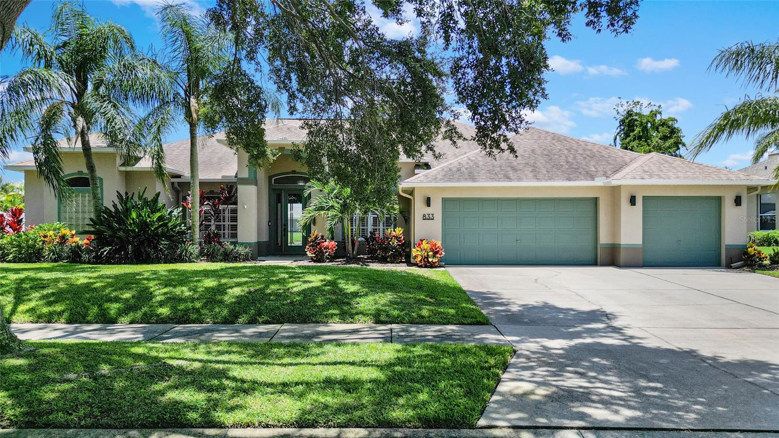 Stunning and fully updated pool home in the highly sought-after Bridgewater subdivision of South Merritt Island. This spacious 4-bedroom, 3-bath residence offers 2,637 square feet of elegant living space with tall ceilings and porcelain tile flooring throughout. Enjoy expansive westerly views of the pond and breathtaking sunsets from the large screened pool and spa area—featuring a brand-new aluminum enclosure, upgraded no-see-um screening, and refreshed pool equipment including a new heater, pump, and waterfall feature.
The beautifully renovated kitchen boasts granite countertops, stainless steel appliances, dual pantries with plywood shelving, and a second oven. All three full bathrooms have been fully modernized with high-end finishes. Recent updates also include a new HVAC system, hot water heater, interior and exterior paint, plantation shutters throughout, two remote-controlled UV blinds in the living room, recessed lighting, updated hardware and fixtures, and additional blown-in insulation.
A Kind whole-house water filtration system is installed at the main, and the 3-car garage offers plenty of space for vehicles and storage. Roof replaced in 2017. Located in Flood Zone X. This well-maintained property offers move-in ready convenience in a peaceful, walkable neighborhood rich with wildlife.