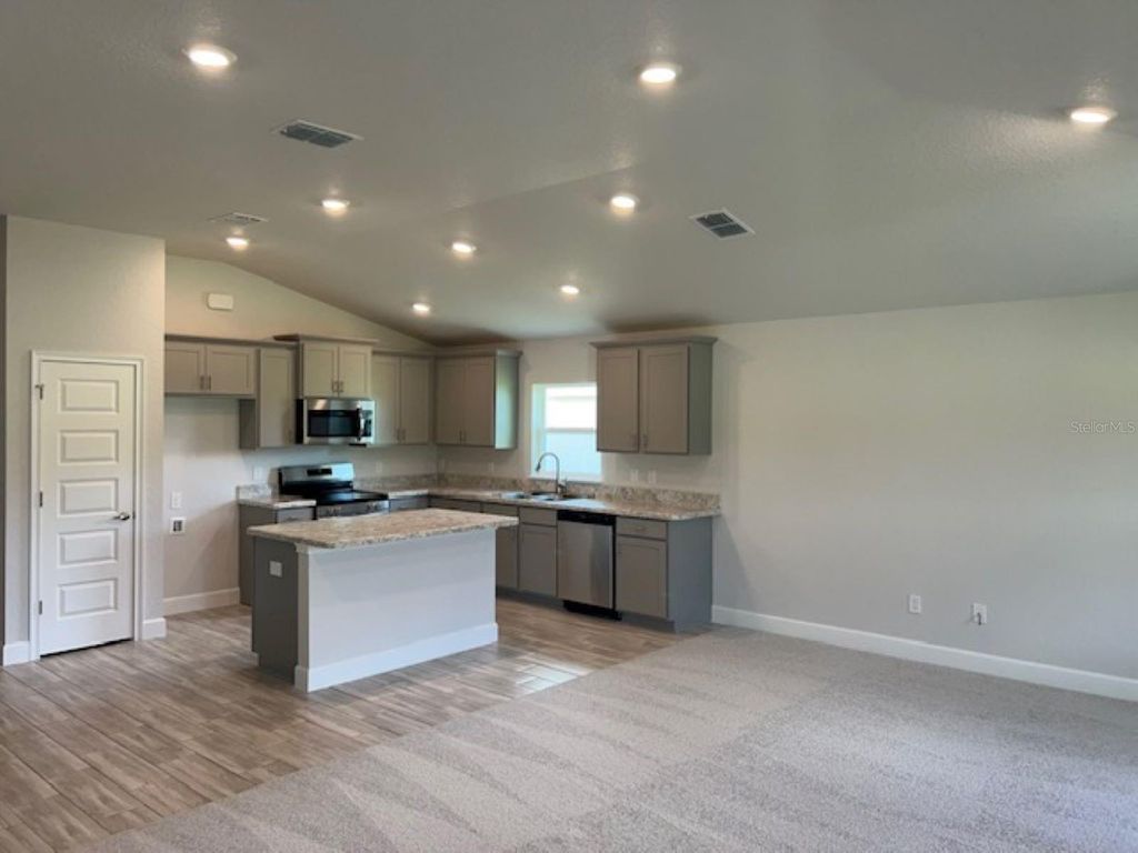 Photo of 2194 NW 23rd Loop, Ocala, FL 34475 (MLS # OM725389)