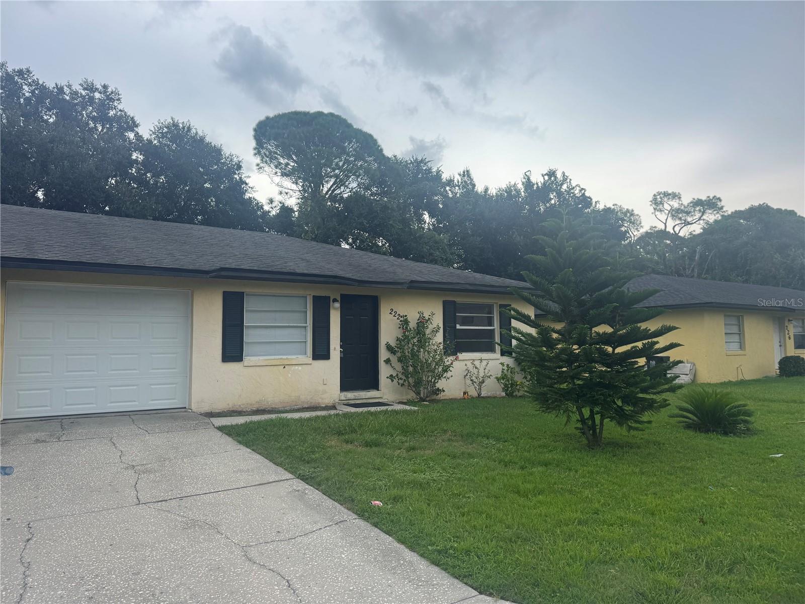 Large 2 bedroom 2 bathroom duplex with one car garage. Open floorplan complete with living room dining room and kitchen area. Great yard with plenty of shade out back. All neutral colors and tile floors throughout.