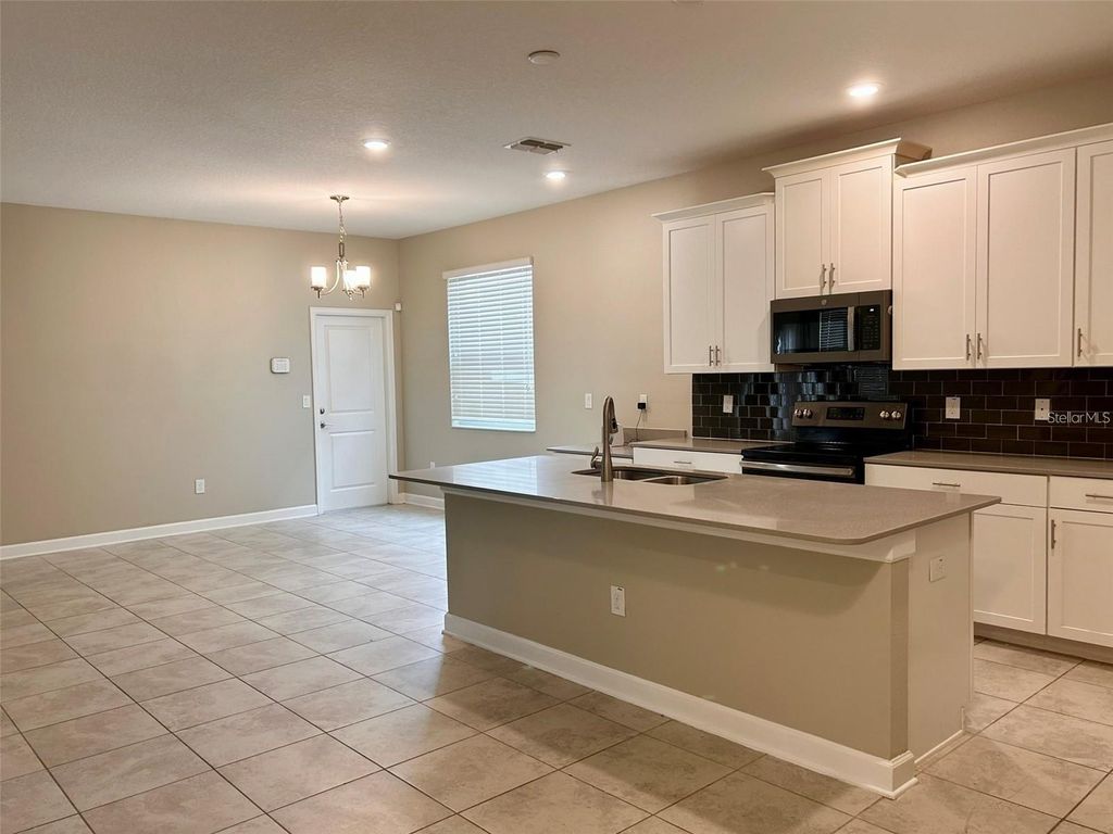Photo of 11950 Philosophy Way, Orlando, FL 32832 (MLS # O6369384)