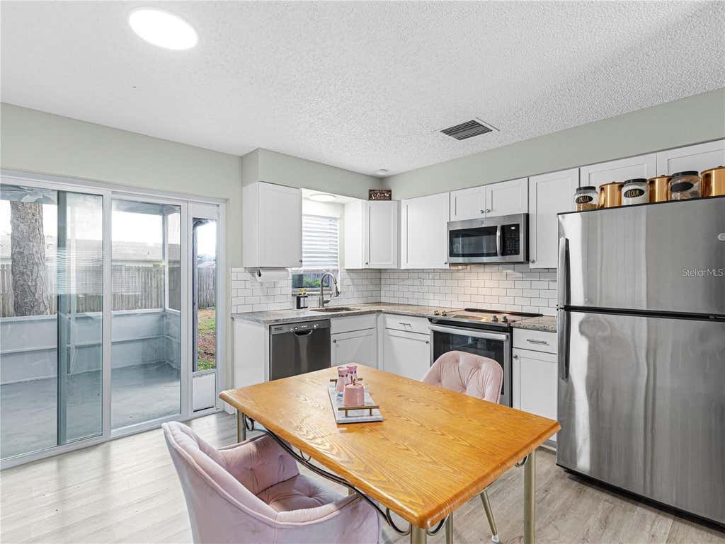 Photo of 3124 Lecanto Street, Holiday, FL 34691 (MLS # O6430360)