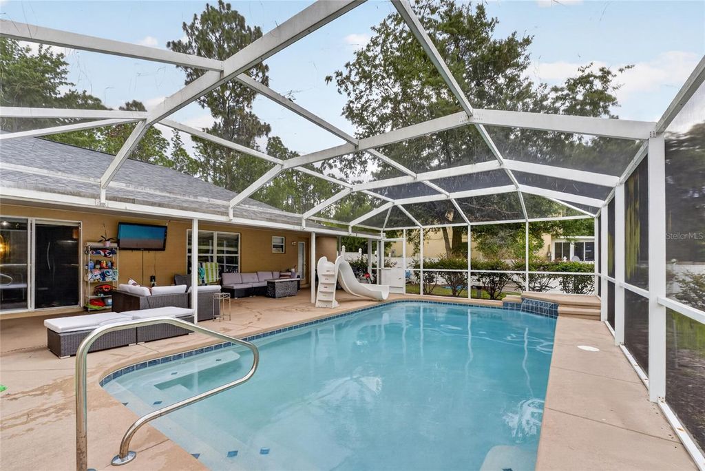 Photo of 20390 SW 57th Street, Dunnellon, FL 34431 (MLS # OM726649)