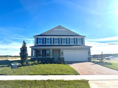 Photo of 11202 Nellie Crossing Circle, Clermont, FL 34711 (MLS # W7879789)