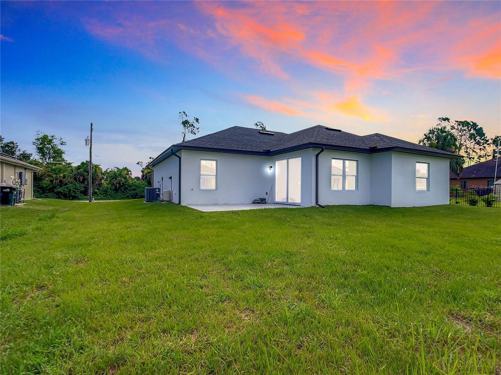Photo of 2165 Music Lane, North Port, FL 34286 (MLS # O6379556)