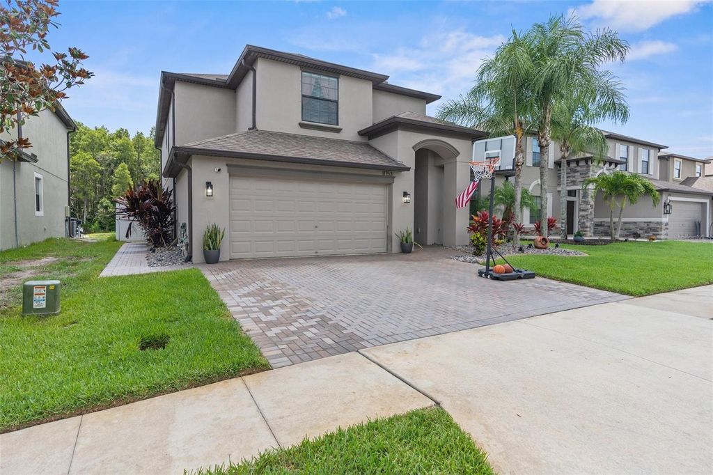 Photo of 11753 Crestridge Loop, New Port Richey, FL 34655 (MLS # W7874029)