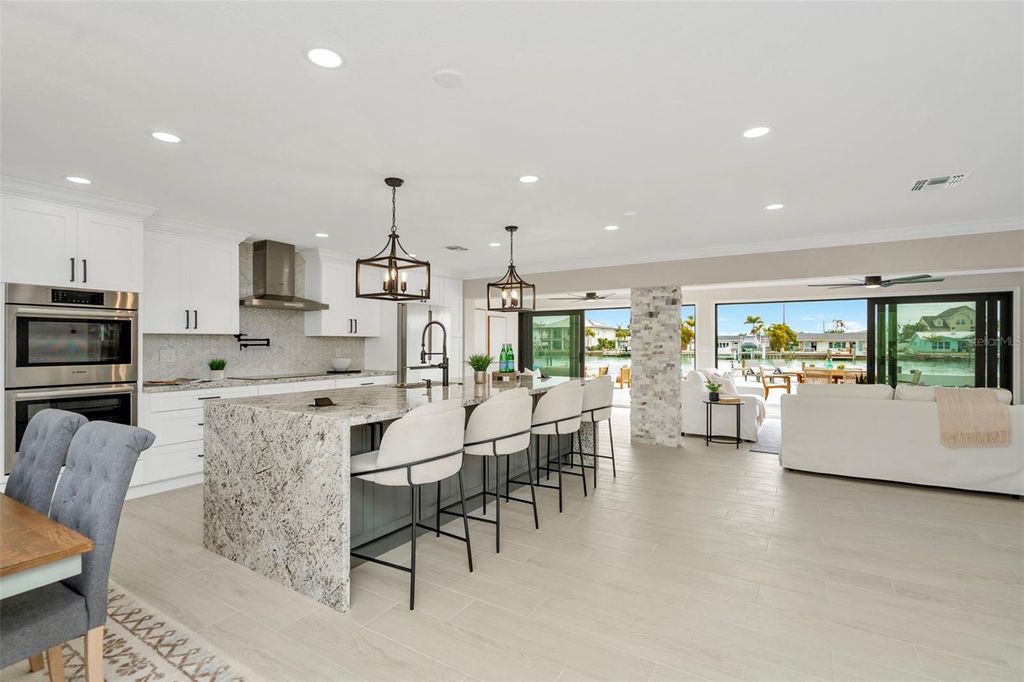 Photo of 825 116th Avenue, Treasure Island, FL 33706 (MLS # TB8475668)