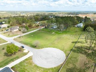 Available Today! This property presents a rare opportunity to build a custom, upscale home in an intimate, deed-restricted community. With 1.39 acres on a peaceful cul-de-sac, the lot is equipped for well and septic installation, backed by HOA-supported infrastructure, and conveniently close to local schools, dining, and university amenities. Homes have a minimum size of 2,500 sf in this community. This property is positioned for buyers seeking both rural charm and modern conveniences. Lot contains dry retention pond. Call today to create your dream home in the last lot in an exclusive 17 home subdivision!