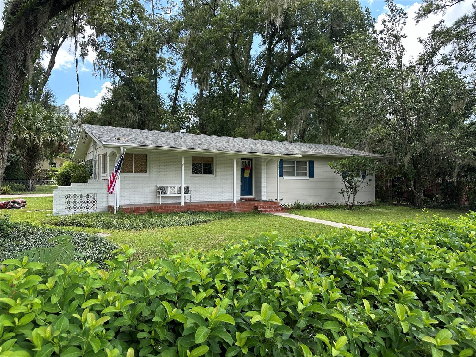 Right across from Fisher Park in highly desirable SE Ocala! This charming 3 bedroom, 2 bathroom block home sits on a spacious corner lot with peaceful views of the park right from the front porch. Enjoy quiet streets lined with mature oaks, all just minutes from Downtown Ocala. Built by Mr. Fisher himself, this home features original hardwood floors throughout, a NEW roof (2019), and a new AC (2022). The unique open floor plan combines the living, dining, and Florida room—something rarely found in homes of this era. Whether you’re a vintage home lover or looking to remodel to your personal taste, this property is full of potential. Don’t miss your chance to experience its charm. Available for rent at $2,500/month for a minimum 3-month period up to 1-year.