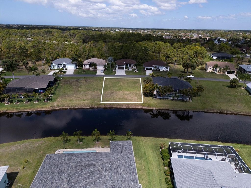Photo of 132 White Marsh Lane, Rotonda West, FL 33947 (MLS # A4688180)