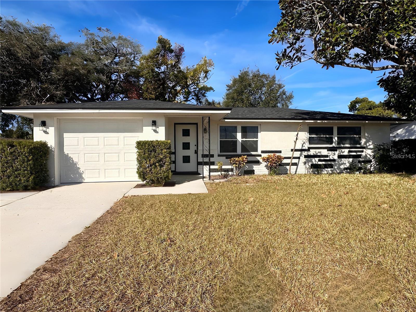 Welcome to 7521 Bougenville Dr in the desirable Jasmine Lakes community of Port Richey. This updated single-family home offers 1,493 sq ft of living space in a NON-FLOOD ZONE, featuring modern upgrades and timeless appeal.
Interior highlights include brand-new luxury vinyl flooring throughout, a fully renovated kitchen with stone countertops, central island with breakfast bar, stylish backsplash, new cabinetry, and all-new stainless steel appliances. The open-concept living and dining areas are filled with natural light. An enclosed Florida room adds versatility—ideal for a second living area, home office, or den.
Both bedrooms provide ample closet space and share a fully updated bathroom with modern finishes. Additional recent upgrades include a NEW roof (2024), HVAC system (2020), updated windows, new sliding glass door, and upgraded lighting throughout.
Enjoy a spacious backyard, perfect for outdoor relaxation or entertaining, and the convenience of an attached 1-car garage.
Conveniently located near shopping, dining, parks, and major roadways, this move-in-ready rental offers comfort, style, and functionality.