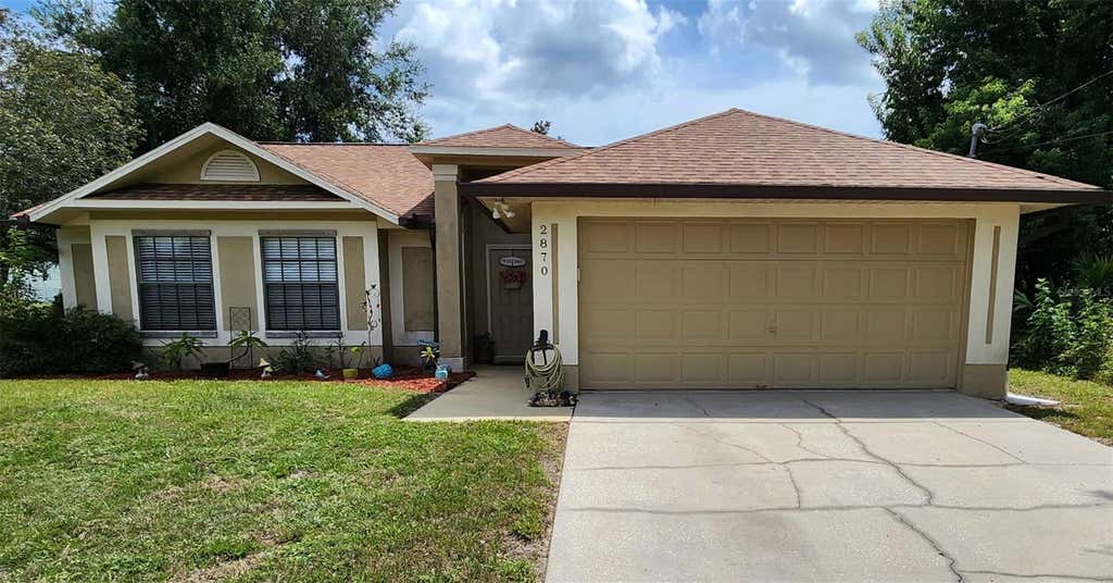 Photo of 2870 Idleweise Drive, Deltona, FL 32738 (MLS # O6433642)