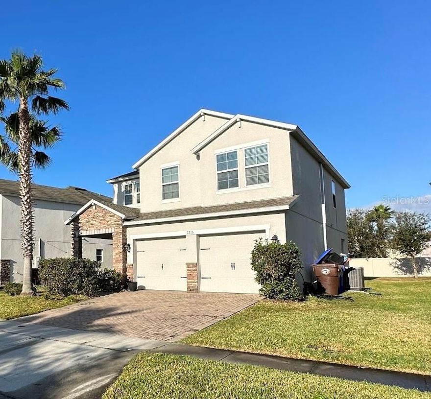 Welcome to this beautifully appointed two-story corner-lot home in the heart of Kissimmee! With exceptional curb appeal including a brick-paved driveway, stone-accented facade, and lush landscaping. This residence offers both elegance and comfort. Home Features: Open-concept floor plan filled with natural light, Elegant tile flooring & modern light fixtures, Spacious bedrooms with abundant natural light, Luxurious primary suite with spa-like ensuite (dual vanities, soaking tub, and walk-in shower). Community Amenities: Resort-style pool & cabanas, Walking trails & playgrounds, Well-maintained neighborhood. Location Highlights: Desirable corner lot, Quick access to Florida's Turnpike, SR-417 & SR-528, Minutes from The Loop, Lake Nona, and Orlando International Airport, Zoned for top-rated Osceola County schools. This home truly combines style, function, and location. Don't miss the chance to call this your next home! No smoking, washer and dryer included. Tenant responsible to replace the water filter in the fridge. The landlord will supply the a/c filters and will come in and replace.