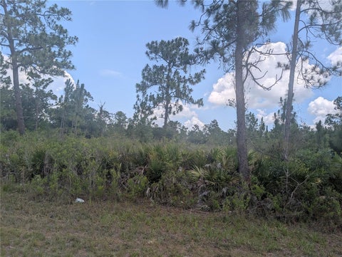 Photo of 904 Laguna Drive, Indian Lake Estates, FL 33855 (MLS # P4939158)