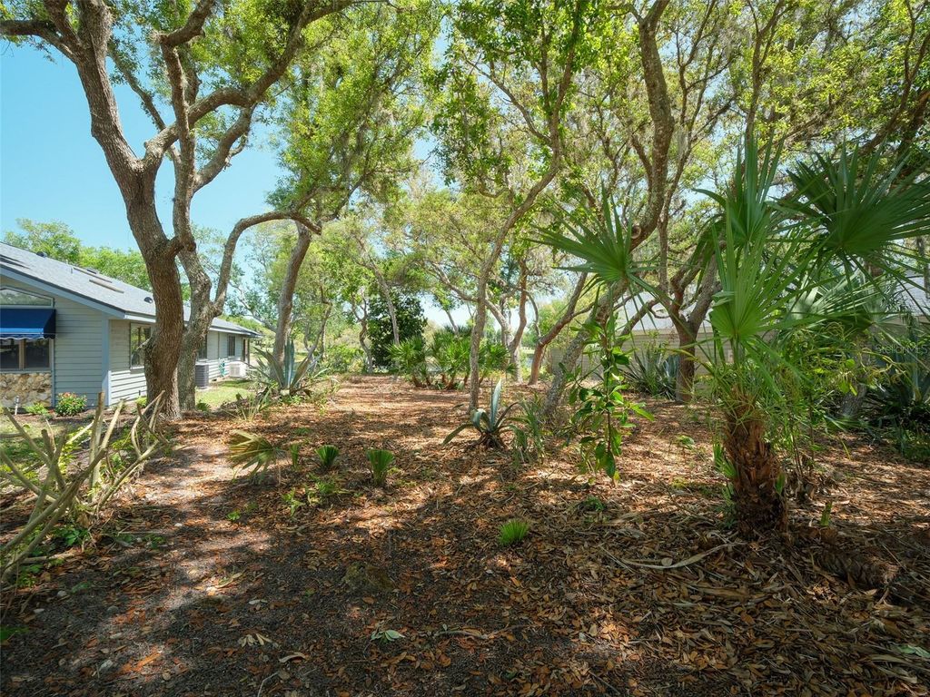 Photo of 1107 Loch Lomond Court, New Smyrna Beach, FL 32168 (MLS # NS1087907)