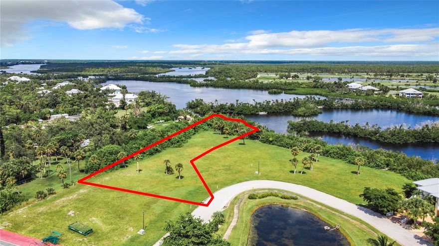 Experience Coastal Luxury on This OVERSIZED WATERFRONT LOT! Nestled in an exclusive gated community in Placida, this nearly one-acre waterfront lot offers the perfect setting to build your coastal DREAM home. With a private dock, you'll enjoy direct water access for boating, fishing, or simply soaking in breathtaking sunsets. Looking for a trusted builder? We can connect you with top local professionals to bring your vision to life! This deed-restricted enclave boasts only nine waterfront lots, ensuring privacy and exclusivity. Enjoy premium amenities, including underground utilities, a tennis court, a serene lake with a fountain, and impeccably maintained green spaces. Located close to local shopping, dining, LIVE entertainment, and award-winning beaches, this is your chance to own a slice of paradise. Don't wait—secure your waterfront retreat today!