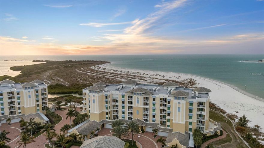 Experience luxury coastal living in this stunning 3-bedroom, 3.5-bath residence at Sunset Pointe on Tierra Verde. Situated in one of the area’s most exclusive gated waterfront communities, this 2,800+ sq ft. unit blends elegant interior design with panoramic water views and unmatched privacy.

Step inside to an expansive open-concept living space featuring floor-to-ceiling impact glass, soaring ceilings, and seamless indoor-outdoor flow to an oversized covered terrace overlooking the Gulf, Shell Key Preserve, and nightly sunsets. The gourmet chef’s kitchen is equipped with top-of-the-line appliances, a large center island, custom cabinetry, and designer finishes—perfect for entertaining. Home has Pelican whole house water filtration system, electric fireplace, leak detection system and electric hurricane shutters.

The spacious primary suite offers breathtaking views, a spa-style bath with dual vanities, a soaking tub, and a generous walk-in closet. Two additional ensuite bedrooms provide ideal accommodations for family or guests. A private elevator entry, premium flooring, and high-end fixtures accentuate the home’s refined style.

Additional features, designer custom buildout and fireplace with heat blower and two-color options, remote electric hurricane shutters, electric remote windows shades thru out.

Sunset Pointe residents enjoy a resort-level lifestyle with exclusive amenities including a beachfront pool and spa, state-of-the-art fitness center, outdoor kitchen pavilion, private beach access, secured under-building parking, and immediate access to pristine walking trails along the Gulf.

Perfectly positioned minutes from Fort De Soto Park, world-class marinas, and the vibrant dining and arts of downtown St. Petersburg, this exceptional home delivers the best of luxury, privacy, and waterfront living on Tierra Verde.

A rare opportunity to own one of the premier units in Sunset Pointe—where every day ends with a sunset.

see live video fly thru