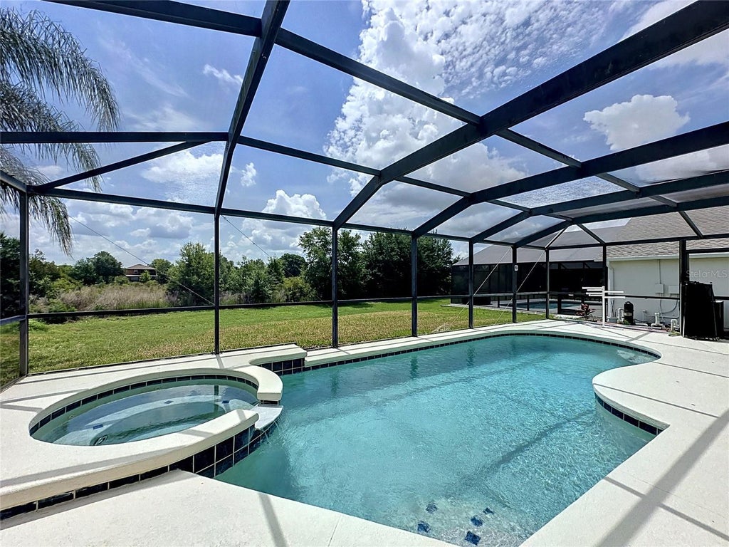 Photo of 822 Balmoral Drive, Davenport, FL 33896 (MLS # S5150256)