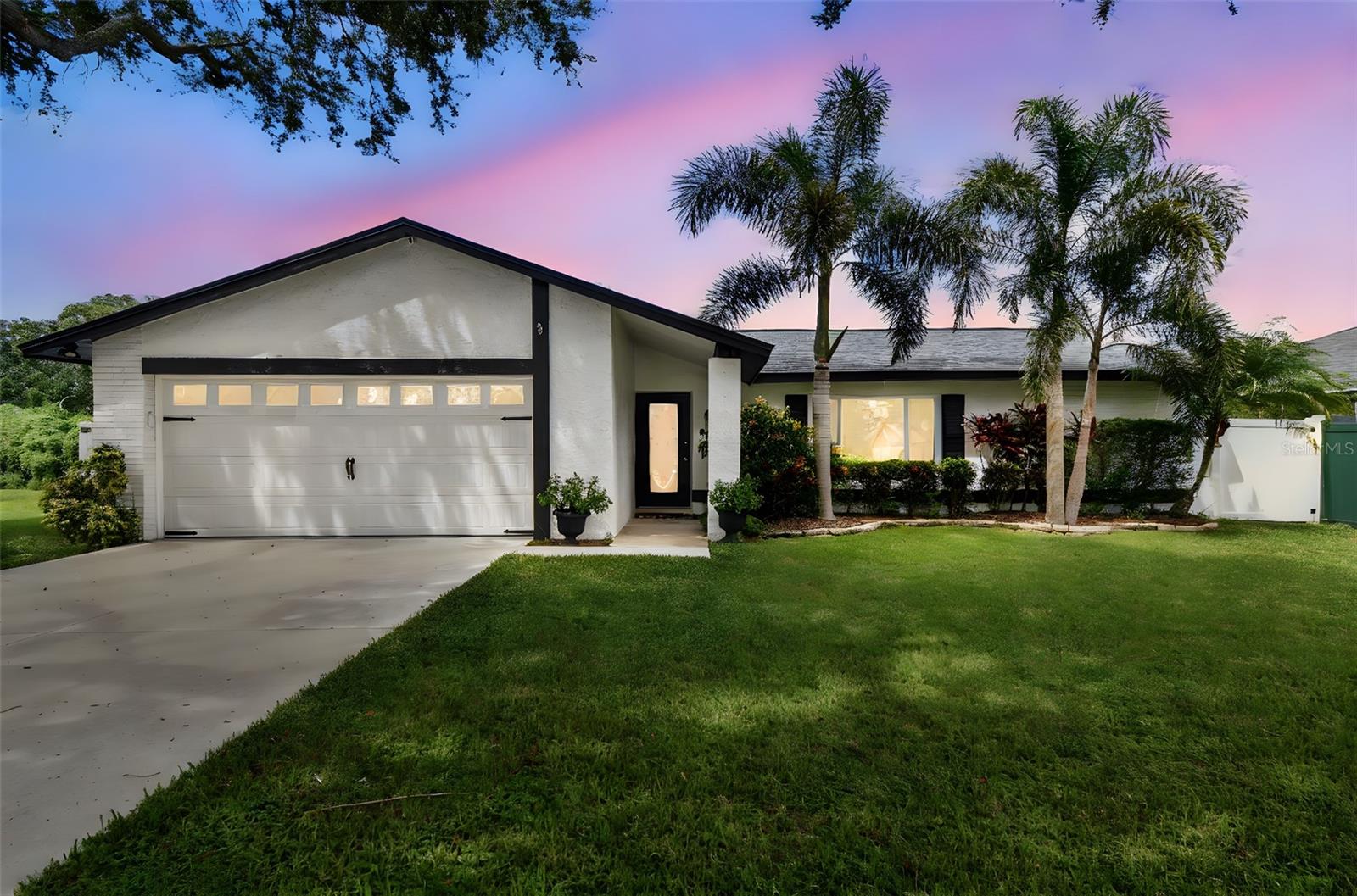 Striking 3 bedroom, 2 bath, pool home centrally located with no HOA! This beautifully maintained and updated home offers 1495 SF of comfortable living space with an open floor plan, split bedrooms and best of all is move in ready! All major concerns have been updated including new flooring and a remodeled kitchen, quartz counter tops and all new LG appliances in 2022. Bathrooms were remodeled in 2018 and 2019. The roof was replaced in 2021 and new windows were installed in 2020. AC was done in 2020 and a new water heater in 2022. Outside, the exterior was repainted within 5 years, a brand new Driveway installed done in 2021, a new garage door added in 2020 and a new garage door opener in 2024. The home also boasts a screened in pool with a newer pool pump and a large lanai area great for entertaining and relaxing. If that's not enough, the home is beautifully landscaped and even has a quality built Shed in the back. Don't miss this rare opportunity to own an amazing home in a great neighborhood! (Some photos have been added using Virtual Staging)