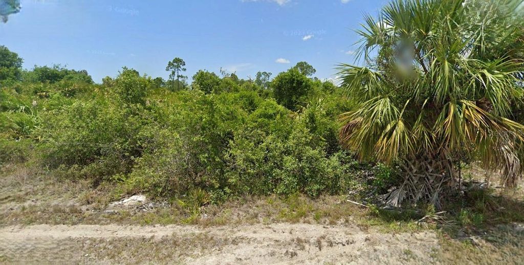 Photo of 730 Ashley Road, Lehigh Acres, FL 33974 (MLS # O6360554)