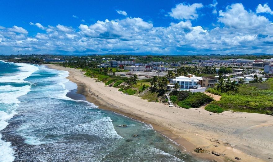 A rare coastal retreat offering exceptional privacy, direct beach access, and panoramic ocean views. Tucked away in a secluded setting, this unique property's delivers a level of exclusivity seldom found in today’s market, making it ideal for discerning buyers seeking both tranquility and investment potential.

In addition to its residential appeal, the property is currently operated as a successful short-term rental and private event venue, with a proven track record of strong income generation. The business component is well-established and transferable, providing an opportunity for a seamless transition to new ownership.

comfortably accommodates up to 15 guests and is designed to create an intimate, resort-like experience away from crowded tourist zones. The home is offered fully furnished, featuring a refined, minimalist aesthetic with high-end finishes that prioritize both comfort and functionality.

Wake up to the sound of the ocean and enjoy uninterrupted water views from multiple vantage points throughout the property. Outdoor amenities include a private pool and thoughtfully designed spaces for relaxation and entertaining.

What truly distinguishes this offering is its unmatched seclusion, with no immediate neighboring properties, ensuring a peaceful and private environment. The property is also equipped with a 20kW backup generator and a 1,000-gallon water cistern, providing reliability and self-sufficiency.

This is a rare opportunity to acquire a turn-key beachfront property that blends lifestyle, privacy, and income-producing potential in one compelling offering.