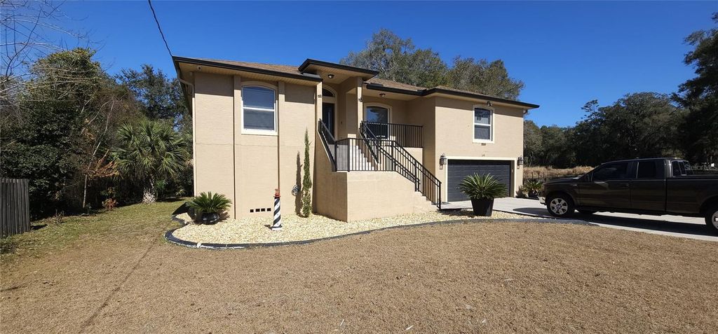 Photo of 690 W Lisbon Parkway, Deland, FL 32720 (MLS # TB8473907)