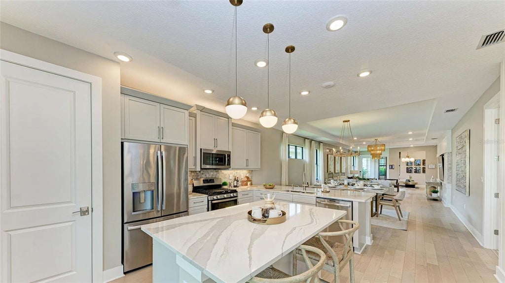Photo of 18402 Rockport Place, Lakewood Ranch, FL 34211 (MLS # W7889928)