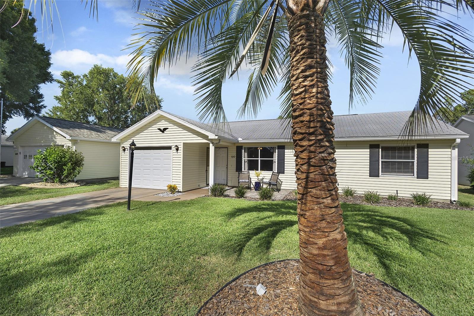 Welcome Home to the charming and peaceful Village of Del Mar, this delightful El Paso Model offers a perfect blend of modern updates and classic Florida living.
This beautifully updated 2-bedroom, 2-bathroom home features an array of contemporary upgrades that make it both functional and stylish. A BRAND NEW ROOF is coming soon, offering years of reliability. The kitchen is a chef’s dream with sleek QUARTZ COUNTERTOPS, providing both beauty and durability. Both bathrooms have been completely updated to enhance the home's modern feel, and with NO CARPET throughout—only wood-look laminate and vinyl flooring—maintenance is a breeze, and the home maintains a fresh, cohesive aesthetic.
HVAC REPLACED 8/19 -- HWH REPLACED 5/19 -- NO BOND !!
Step outside to discover the EXPANSIVE LANAI & BIRDCAGE, complete with a large birdcage for enjoying the outdoors in complete privacy. The rear yard is a serene retreat, with no neighbors behind, allowing you to enjoy your surroundings in peace. A unique feature of this home is the golf cart parking in the rear, conveniently located within the screened portion of the lanai, making it easy to access your golf cart whenever you're ready to explore the community. Residents of Del Mar enjoy the best of The Villages lifestyle, with the vibrant Spanish Springs Town Square just around the corner. The Rio Grande Recreation Center, complete with a family pool, is a fantastic spot for the kids and grandkids to have fun and cool off. The center also features a well-maintained grass lawn bowling site for those seeking a leisurely activity. For adults, the Chula Vista Club is an inviting place to relax by the pool, while those in the mood for some friendly competition can choose from volleyball, tennis, shuffleboard, bocce, or the popular game of pickleball. Golf enthusiasts will appreciate the proximity to two fantastic executive courses: Chula Vista and Mira Mesa.
Whether you're relaxing indoors or enjoying the outdoors, this home offers the ideal space for Florida living. With its pristine updates, private backyard, and unbeatable location in The Village of Del Mar, this home is ready to welcome its next owner.