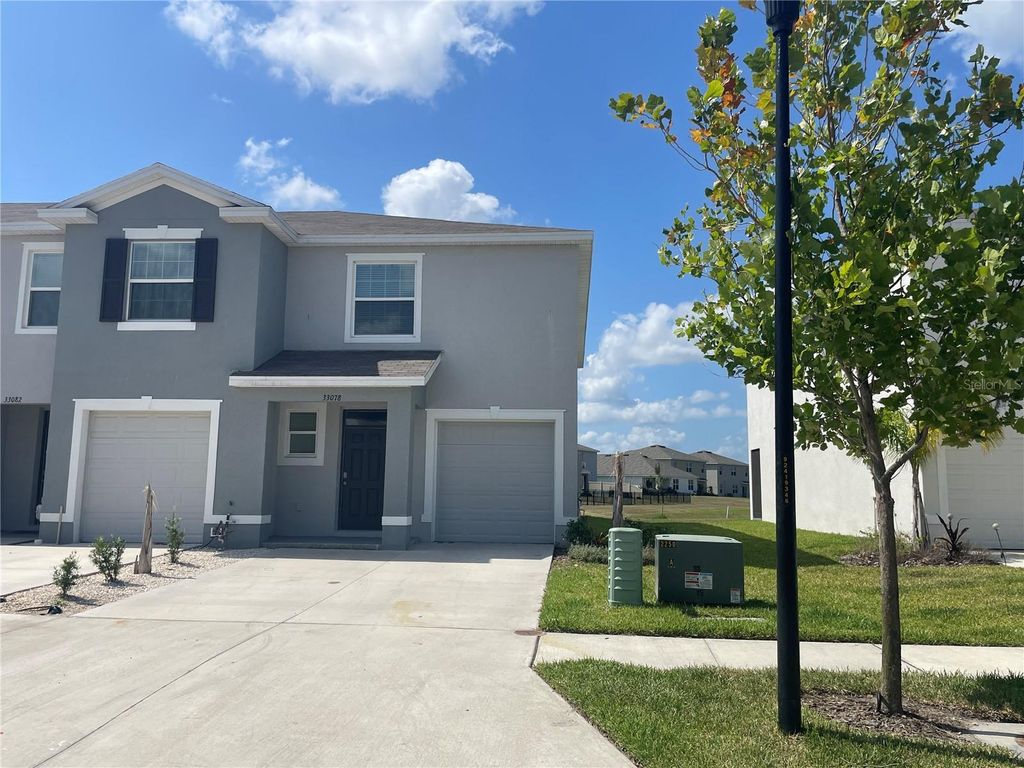 Photo of 33078 Major Oak Dr, Wesley Chapel, FL 33545 (MLS # TB8408170)