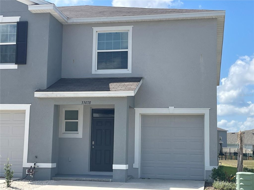 Photo of 33078 Major Oak Dr, Wesley Chapel, FL 33545 (MLS # TB8408170)