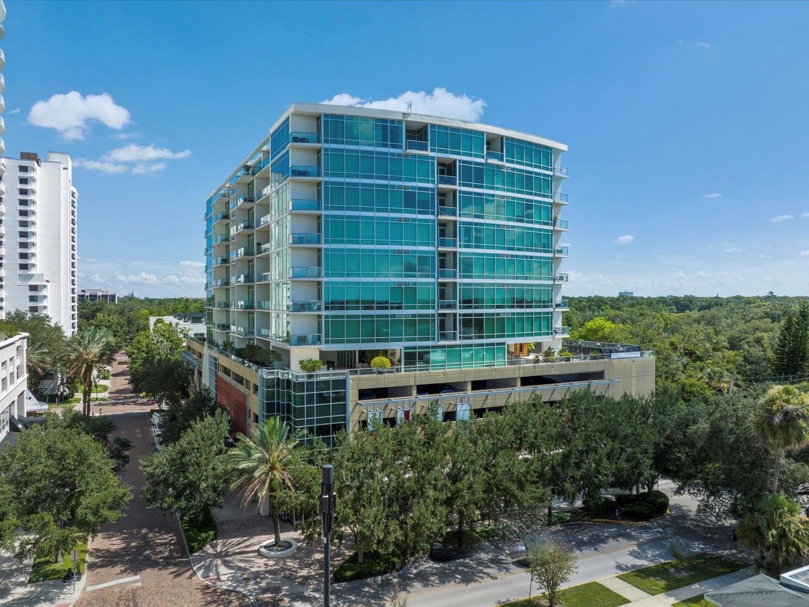Now Available | Luxe Executive Rental in the Heart of Downtown Orlando — Steps from Lake Eola
Welcome to 101 Eola, where upscale urban living meets stylish sophistication. This stunning 2-bedroom, 2-bath executive residence has been fully renovated and exquisitely furnished with designer décor, smart home features, and upscale modern finishes throughout.
Step into a light-filled, open-concept layout boasting motorized window treatments, tile and wood flooring, and plush carpet in the bedrooms for added comfort. Enjoy immersive entertainment with a 75" smart TV and surround sound in the living area, and a 65" smart TV in the primary suite — both paired with premium sound bars and subwoofers. Custom built-in closets, dimmable designer lighting, a tankless hot water heater, and a brand new AC and newer washer & dryer elevate everyday living.
The gourmet kitchen is fully equipped with upscale appliances, cookware, and a Nespresso machine — perfect for morning indulgence. Both spa-inspired bathrooms come stocked with luxury linens and thoughtful touches for a turnkey experience.
Included in the lease: 2 Assigned Gated Parking Spaces & 24-Hour Building Security & Controlled Access. Live just steps from Lake Eola Park and indulge in the best of downtown Orlando — from Broadway shows and wine walks to weekend farmers markets, fine dining, sporting events, and boutique shopping.