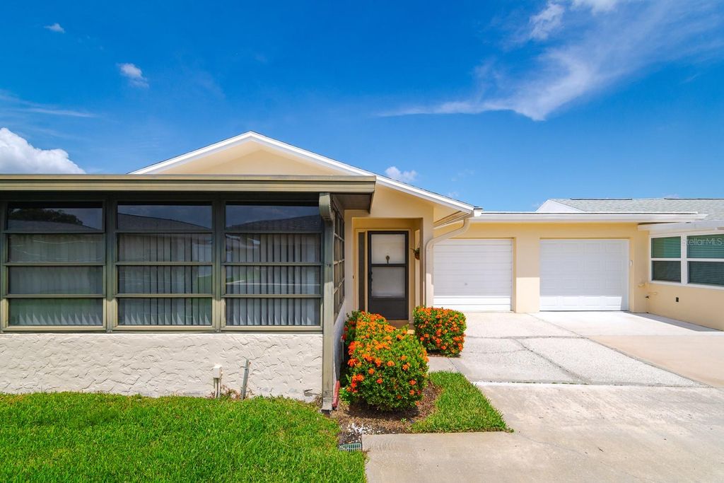 Photo of 2719 Sherbrooke Lane #C, Palm Harbor, FL 34684 (MLS # TB8416873)