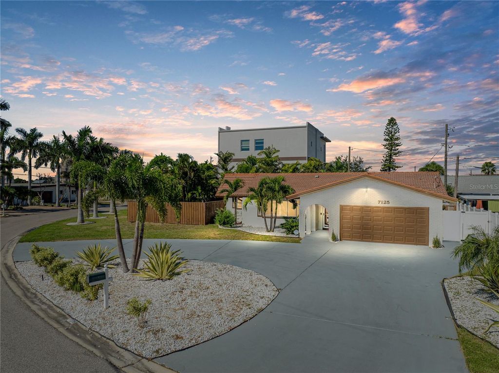 Photo of 7125 S Shore Drive S, South Pasadena, FL 33707 (MLS # TB8437246)