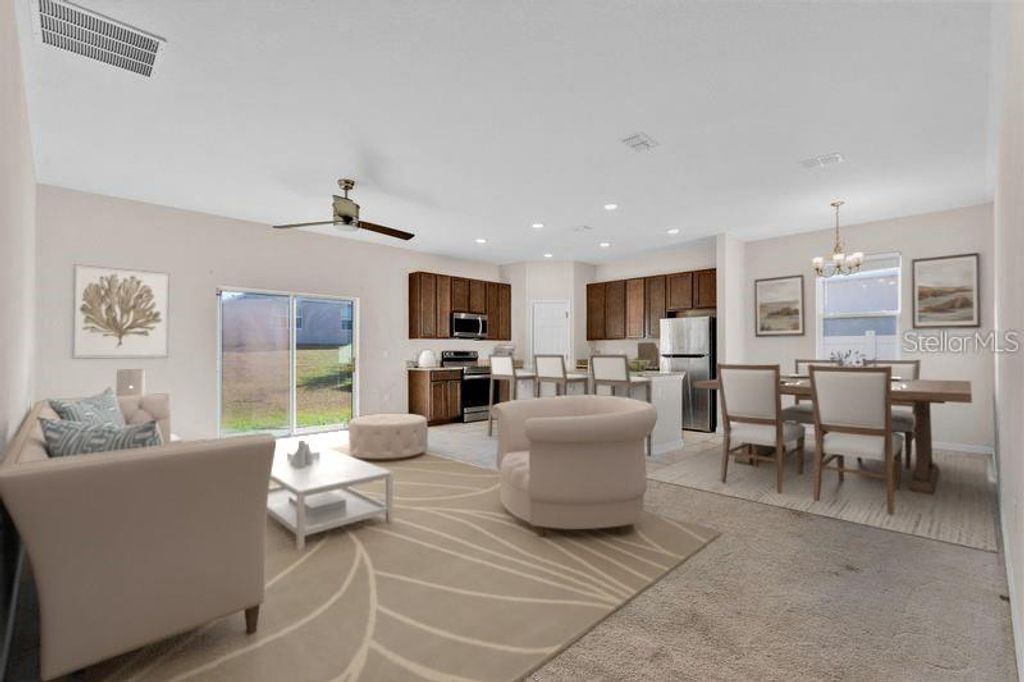 Photo of 3345 Curlew Avenue, Leesburg, FL 34748 (MLS # O6344542)