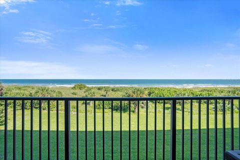 Photo of 3170 N Atlantic Avenue #306, Cocoa Beach, FL 32931 (MLS # O6328661)