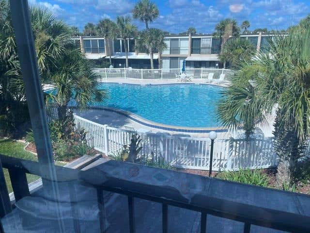Photo of 5500 Ocean Shore Boulevard #UT42, Ormond Beach, FL 32176 (MLS # FC320897)