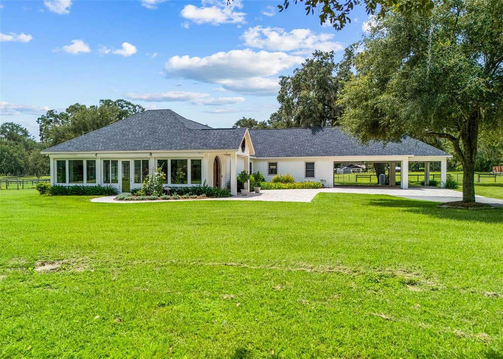Photo of 402 SW 127th Place, Ocala, FL 34473 (MLS # OM730520)