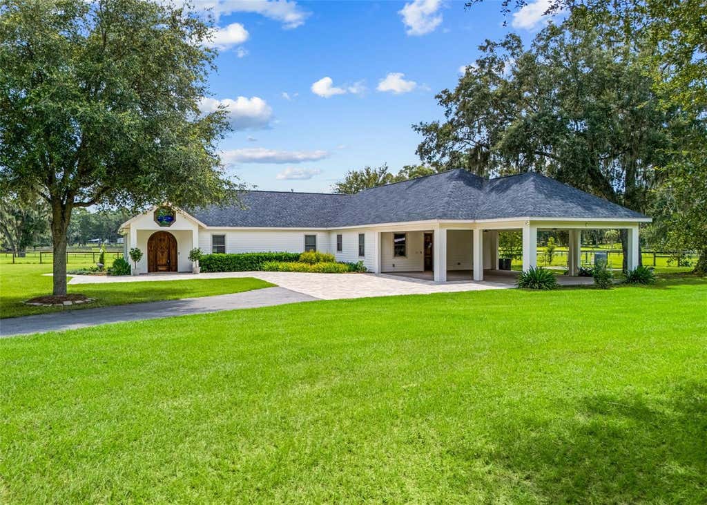 Photo of 402 SW 127th Place, Ocala, FL 34473 (MLS # OM730520)