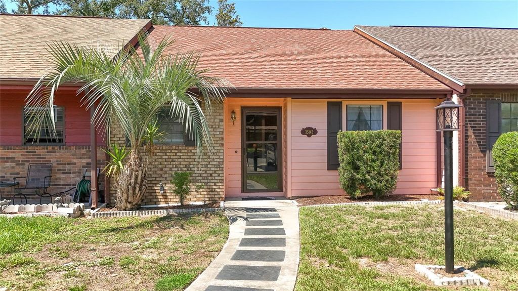 Photo of 35145 Whispering Oaks Boulevard, Dade City, FL 33523 (MLS # TB8386107)