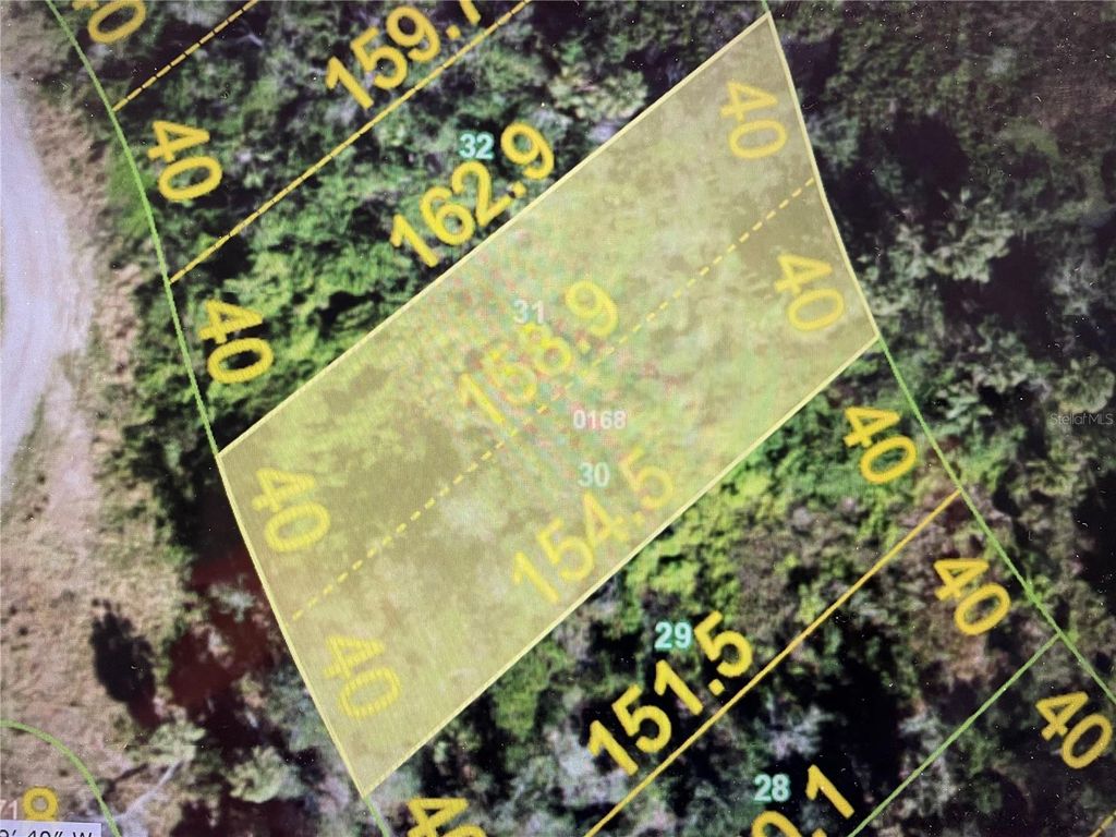 Photo of 27512 San Carlos Drive, Punta Gorda, FL 33983 (MLS # O6312759)