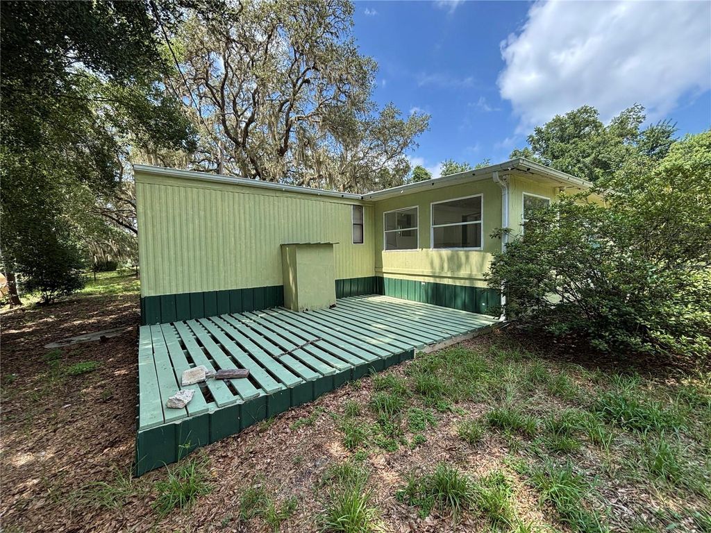 Photo of 18274 SE 22nd Place, Silver Springs, FL 34488 (MLS # OM728850)