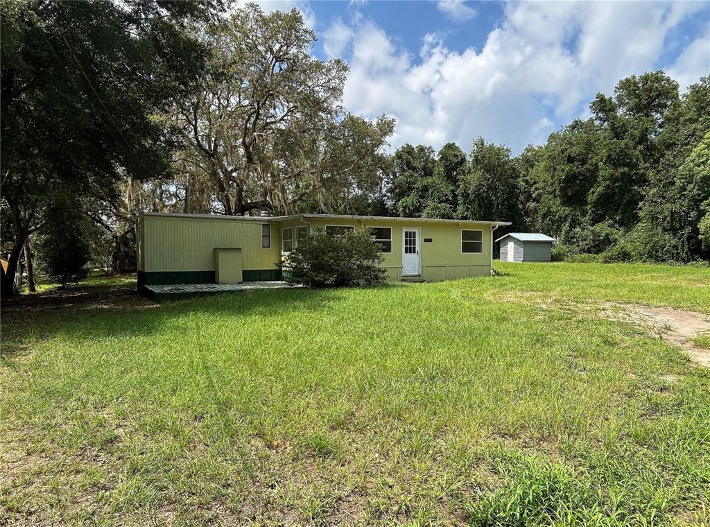 Photo of 18274 SE 22nd Place, Silver Springs, FL 34488 (MLS # OM728850)