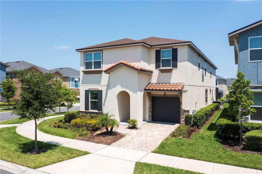 Photo of 9039 Pelican Cove Trace, Kissimmee, FL 34747 (MLS # O6363608)