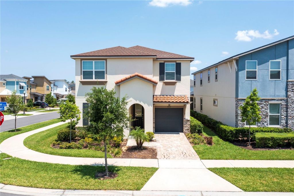 Photo of 9039 Pelican Cove Trace, Kissimmee, FL 34747 (MLS # O6363608)
