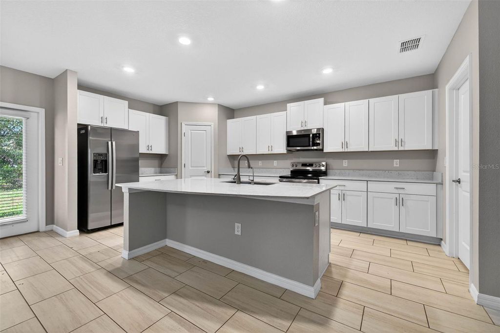 Photo of 12651 Maple Bonsai Drive, Riverview, FL 33579 (MLS # TB8453337)