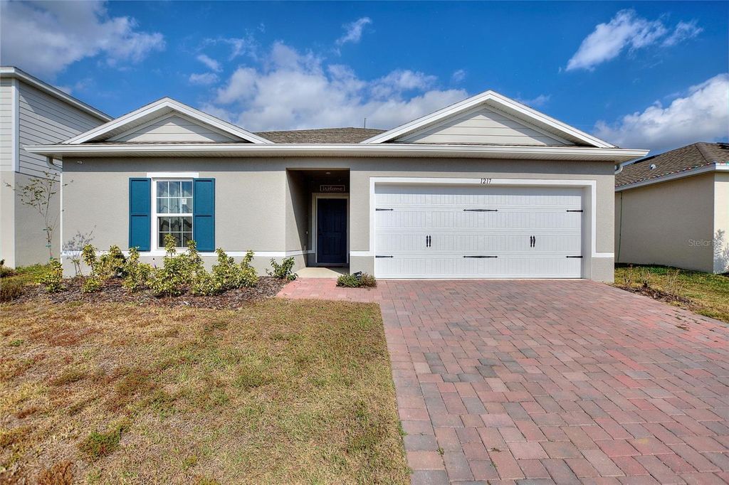 Photo of 1217 Lexington Lane, Haines City, FL 33844 (MLS # O6363170)